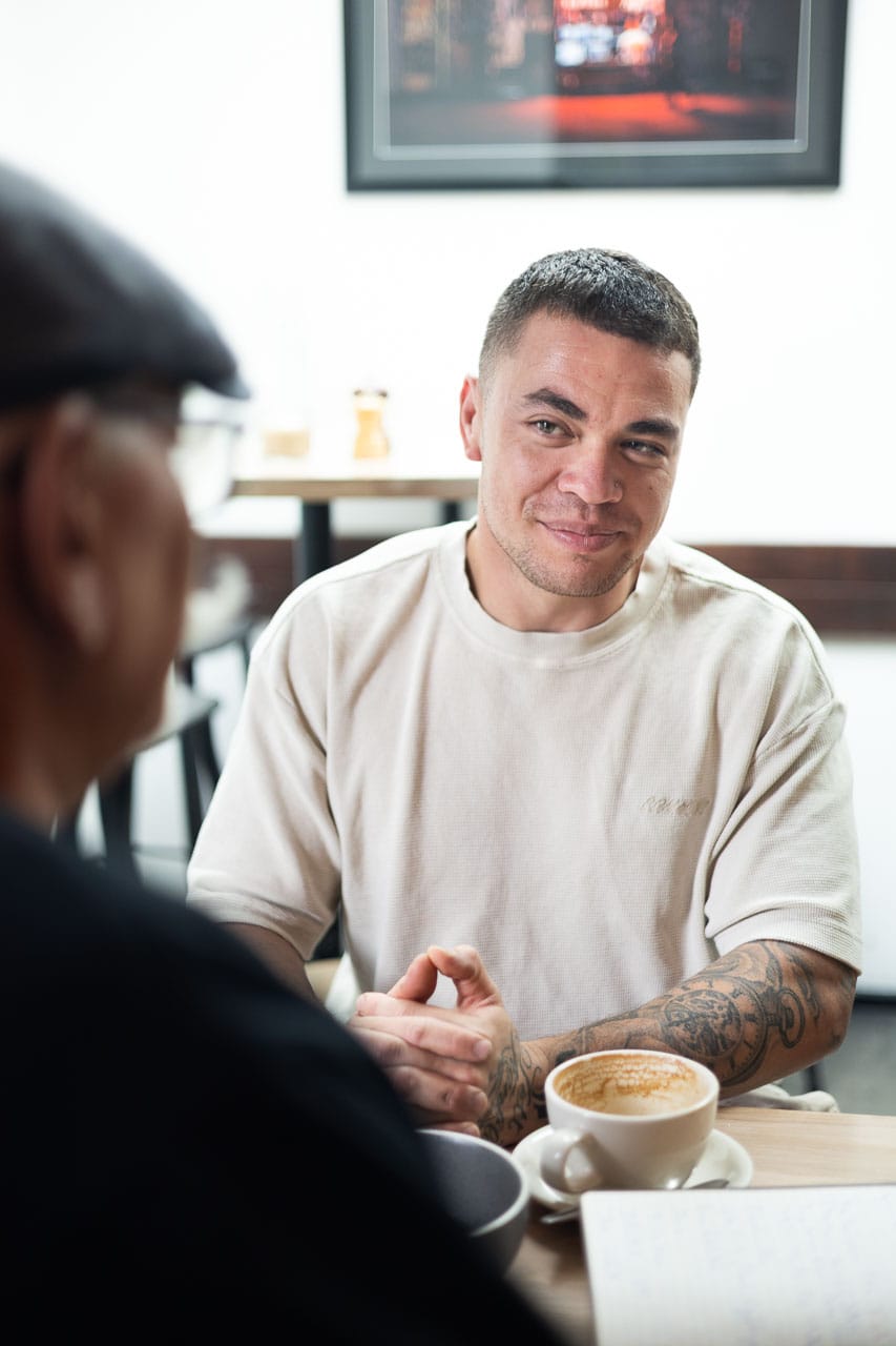 Melbourne tradie having coffee catchup with business coach in Melbourne